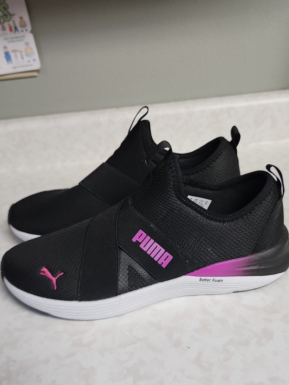 PUMA Women’s Black Slip-On Sneakers with Pink Accents 9.5 number 880